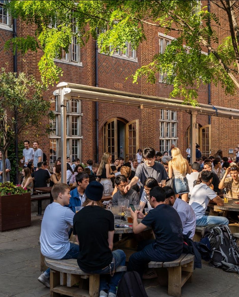 Beit quad busy with students in the summertime outside 568